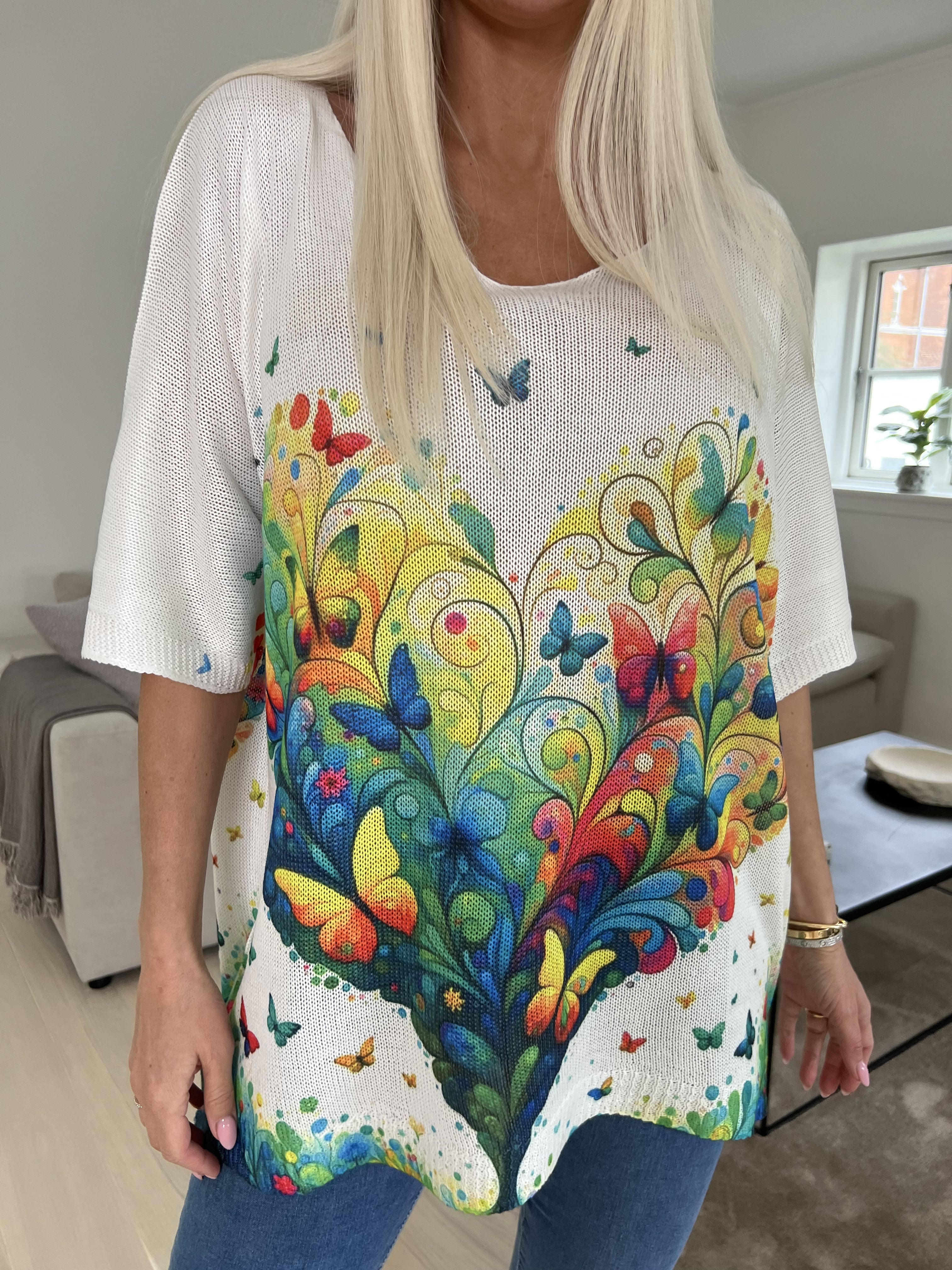 Inaya - Stickad blus med fjärilsmönster